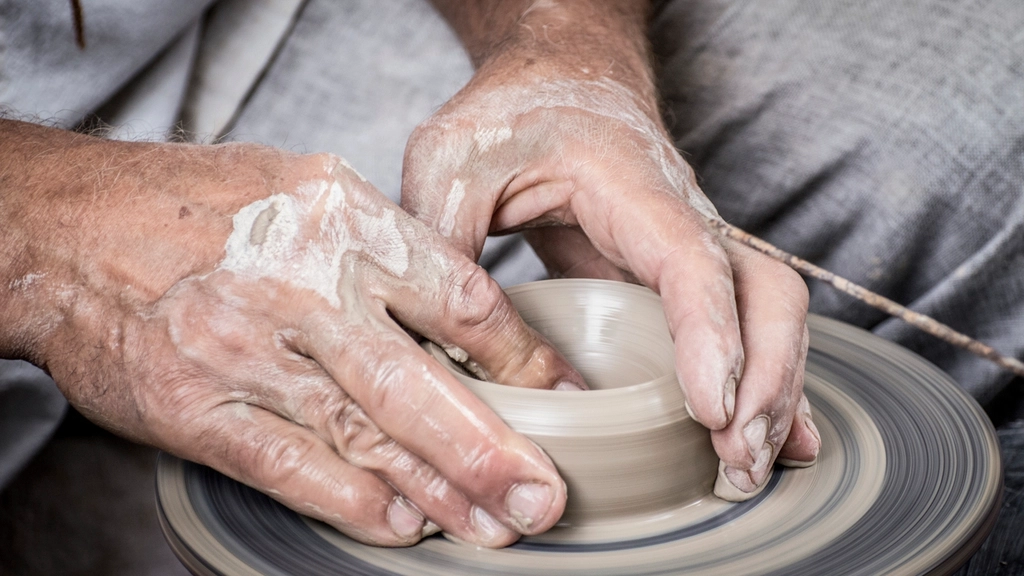 Clay being shaped by hand